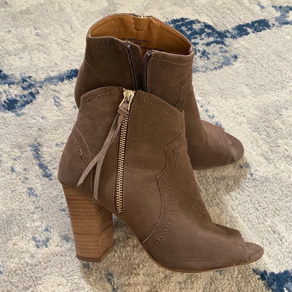 Open toed booties with gold zipper